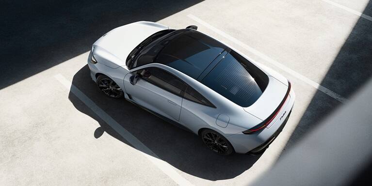 2027 Honda Prelude in Winter Frost Pearl with Two-Tone, overhead view in a parking lot (exhilarating hybrid coupe).